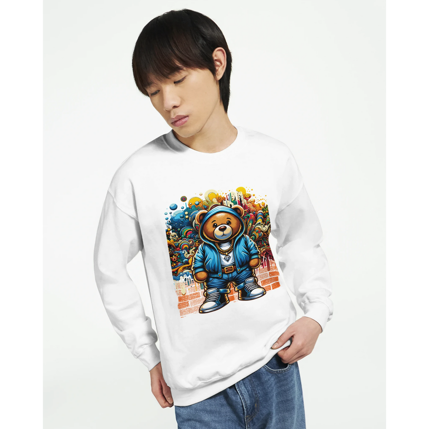 Person wearing a white men's graphic sweatshirt with a colorful bear graphic design.