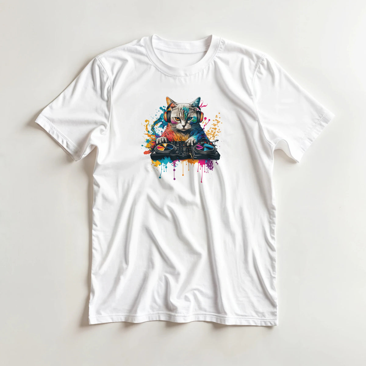 White men's streetwear tee featuring a colorful graphic of a cat DJ mixing on turntables with vibrant paint splashes and headphones.
