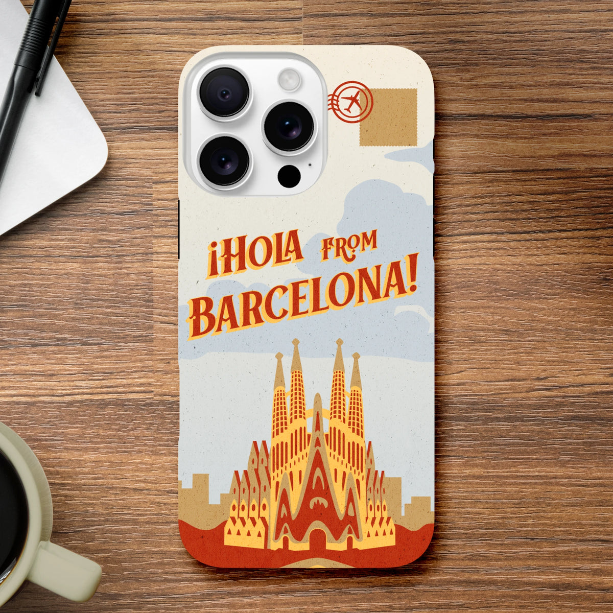Vintage Barcelona postcard iPhone case featuring Sagrada Familia illustration and "Hola from Barcelona" text for iPhone 13-16.