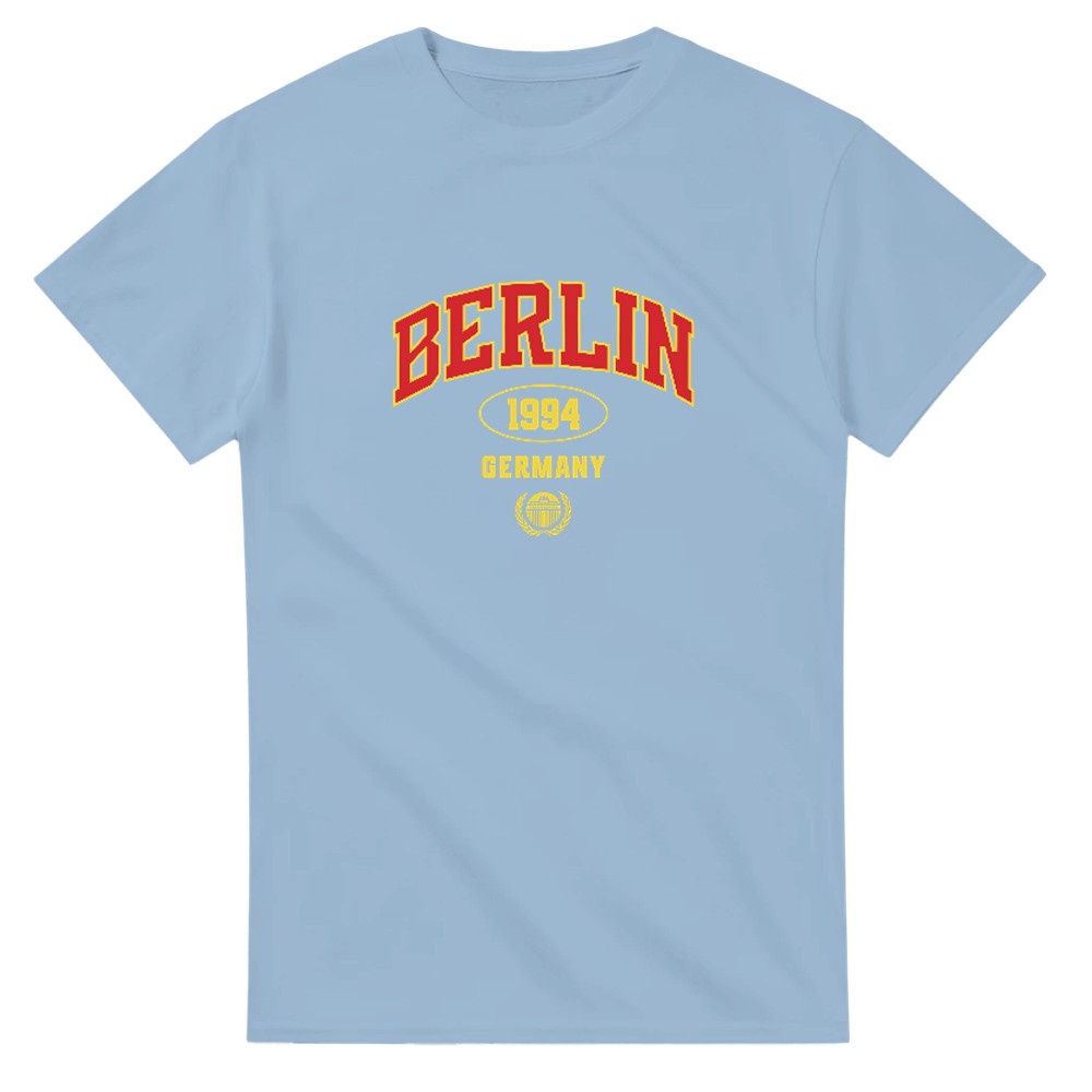 Light blue Berlin graphic T-shirt with red BERLIN lettering and yellow 1994 Germany emblem on chest.