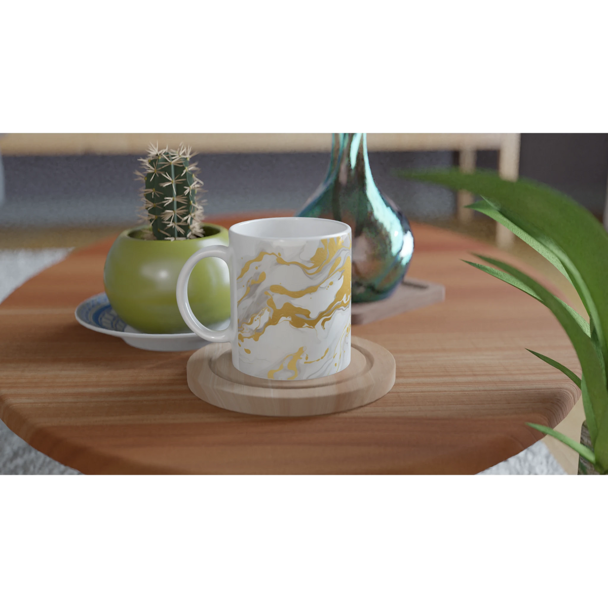 Gold & White Marble Mug, luxury abstract ceramic coffee cup, on wooden table with a cactus nearby.