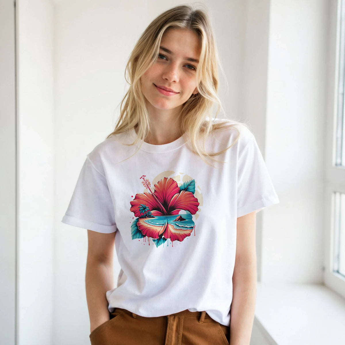 Woman wearing white hibiscus graphic T-shirt with colorful tropical flowers, retro summer style.