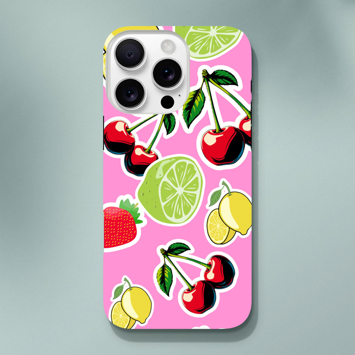 Pink iPhone case featuring cherry, lime, and lemon fruit sticker design with shock-absorbing tough protection for daily commute.