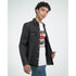 Male model wearing Japanese JDM graphic T-shirt in white, soft cotton blend, under black denim jacket with car print.