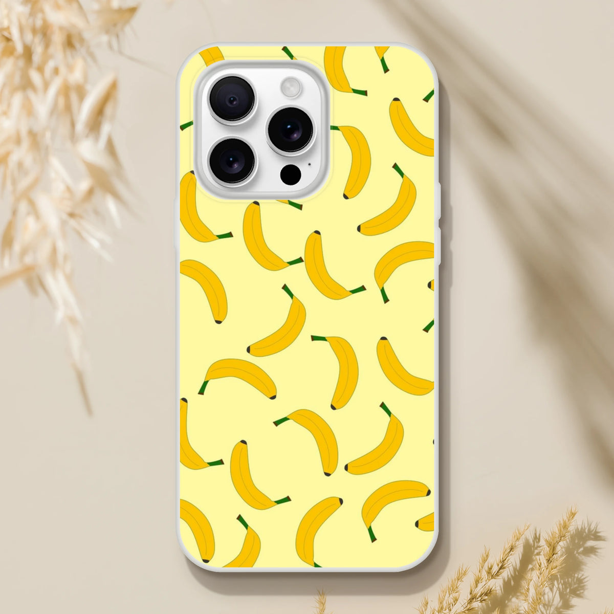 Yellow banana-pattern iPhone case for 13–16 models, slim matte shell with shock-absorbing protection.