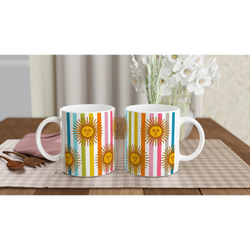 Set of three Retro Rainbow Sun Mugs with multicolor stripes and sun motif on a dining table.