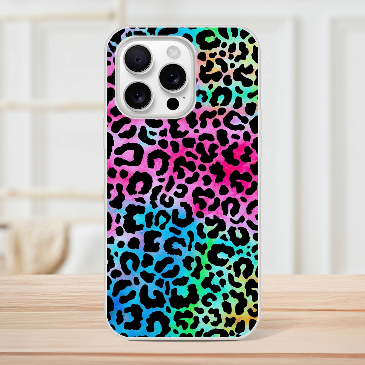 Rainbow leopard print iPhone case for iPhone 13-16 with slim matte finish and bold pattern.