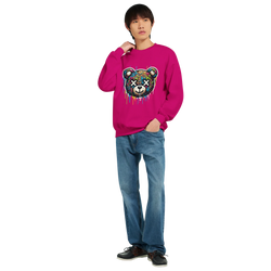 Man wearing bright pink Teddy Bear graphic sweatshirt with dripping paint design, paired with jeans.