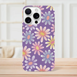Purple retro floral iPhone case featuring pastel daisies. Shock-absorbing TPU cover for iPhone 13-16.