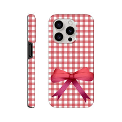 Red gingham iPhone case featuring a large pink coquette bow graphic. Streetwear-style tough cover for iOS 13-16 devices.