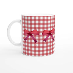 Red gingham bow mug with a pink ribbon bow and white handle, ceramic daily coffee cup.