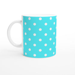 Aqua blue ceramic mug with white polka dots. Cute retro coffee cup for daily brews, office use, or gifting.