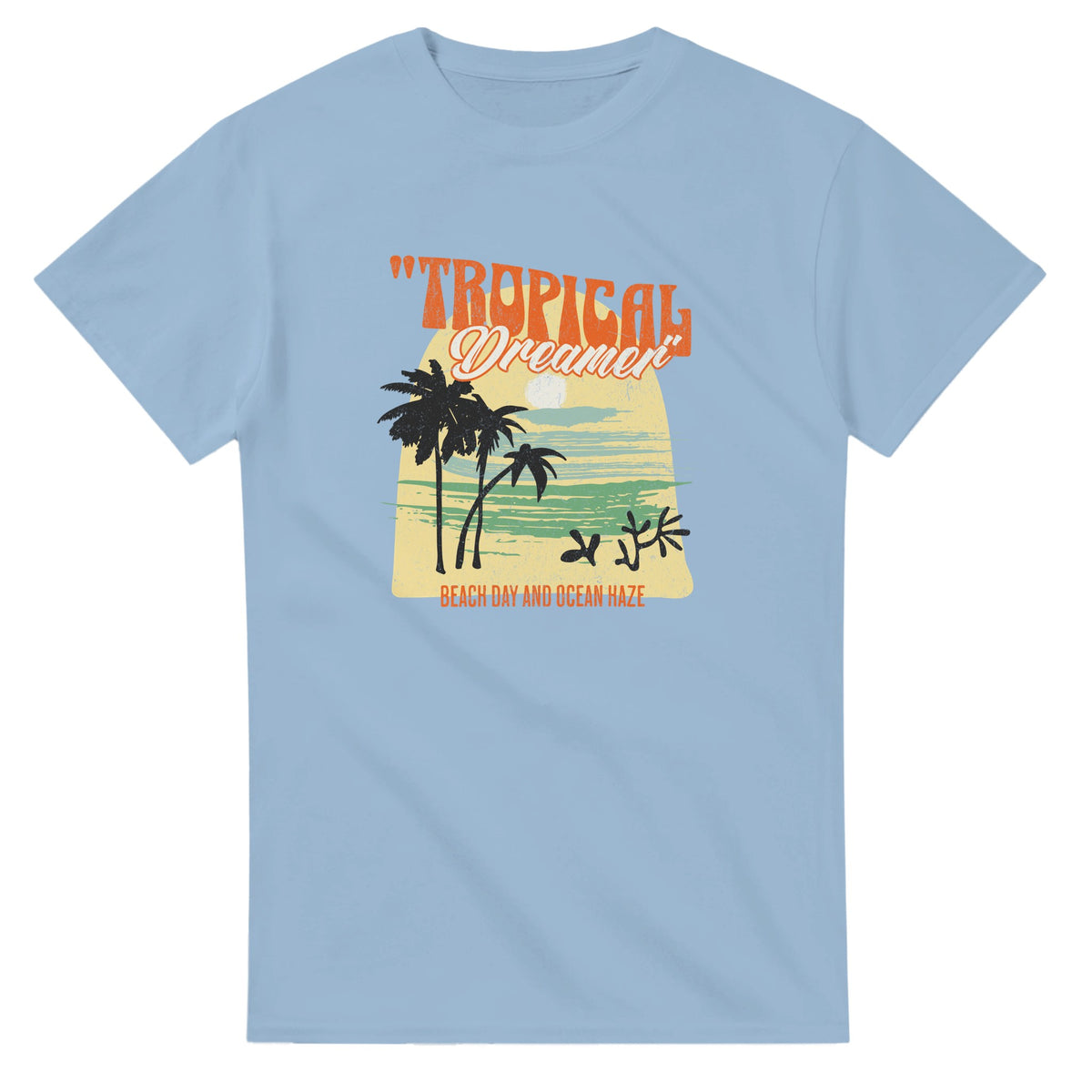 Tropical Dreamer women's short-sleeve graphic tee with palm trees and sunset on light blue cotton.