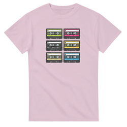 Pink t-shirt featuring six colorful retro cassette tapes in a grid. 80s music aesthetic vintage audio graphic top for women.