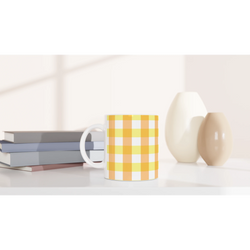 Yellow gingham ceramic mug with a checkered pattern, ideal for coffee or tea at home, office, or gifting.