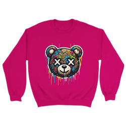 Pink sweatshirt with a multicolor graffiti teddy bear, X-eyed face, and dripping paint.