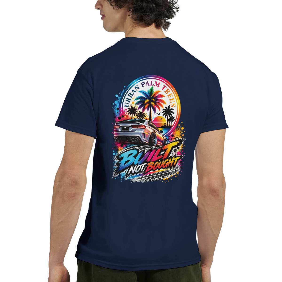 Navy men's t-shirt back featuring colorful "Built Not Bought" graphic with modified car and palm trees.