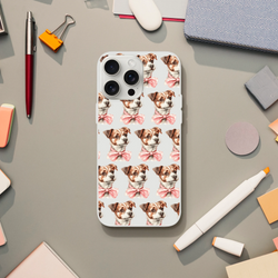 Slim clear protective case for iPhone 13–16 featuring a repeating pattern of cute dogs with pink bows.