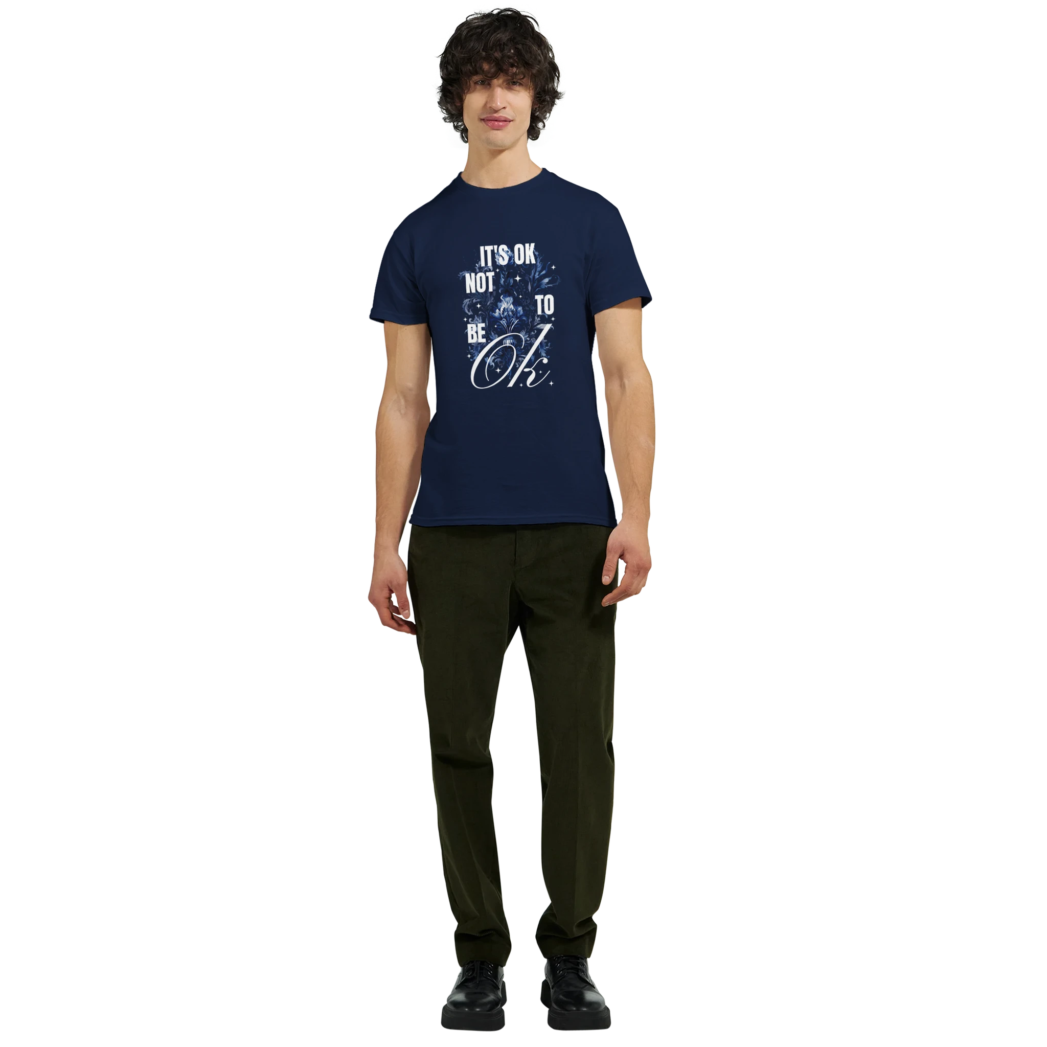 Male model in navy Slogan T Shirt It's OK Not To Be OK graphic tee with white print.