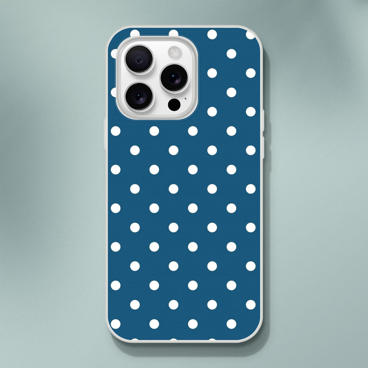 Retro navy blue and white polka dot iPhone case with matte finish and shock-absorbing TPU protection for models 13-16.