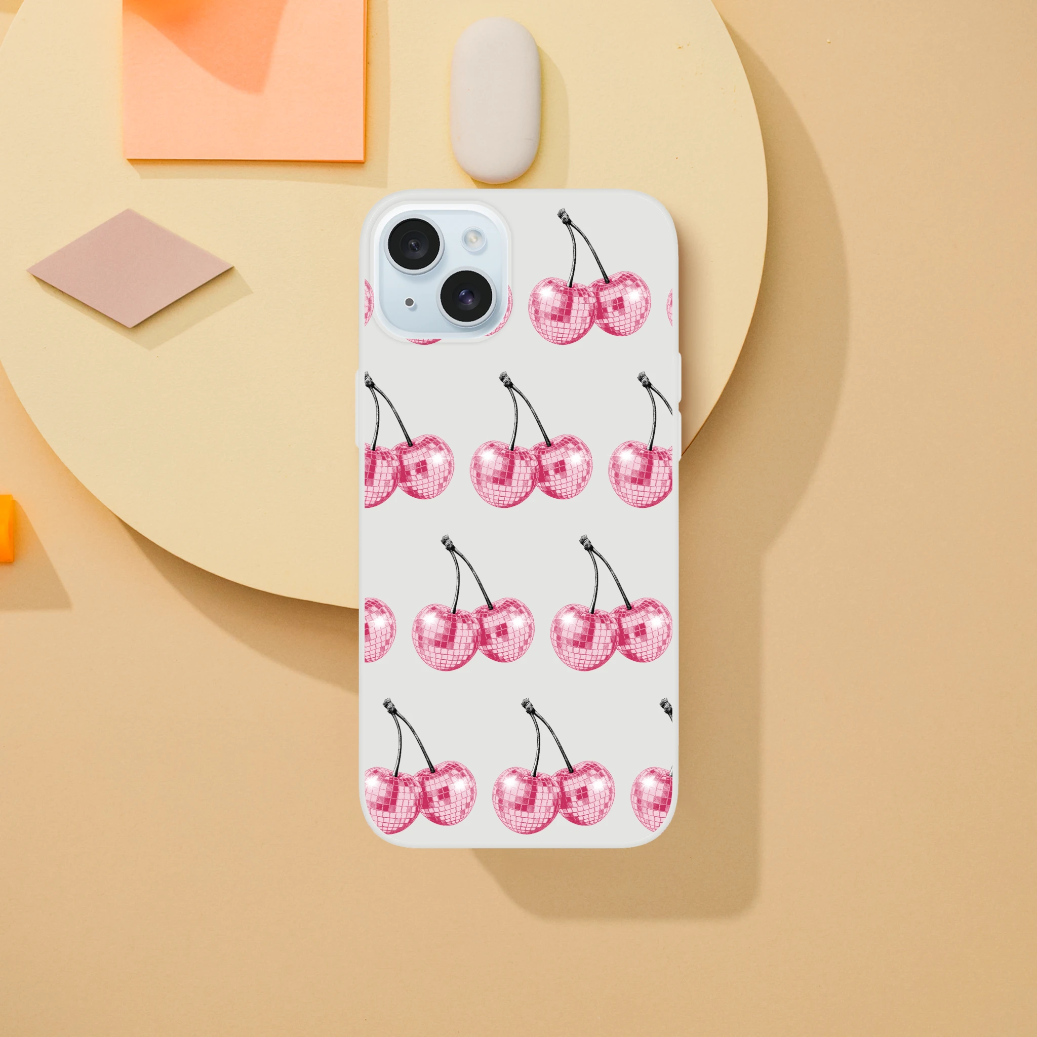 Slim clear iPhone case with pink disco-ball cherry pattern for iPhone 13–16.