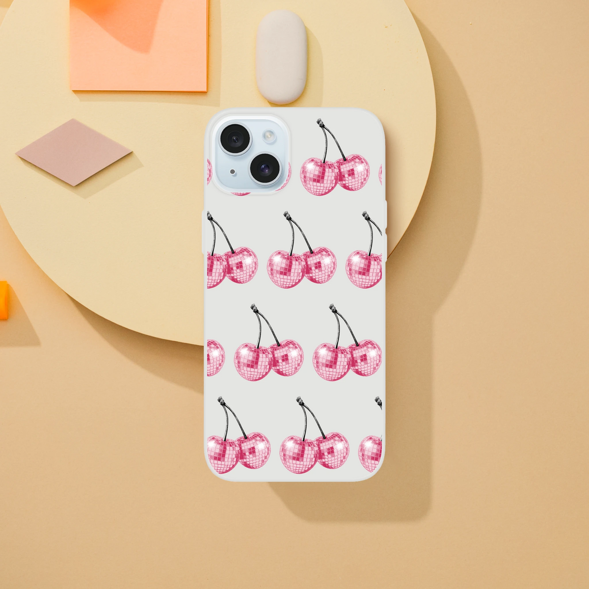Slim clear iPhone case with pink disco-ball cherry pattern for iPhone 13–16.