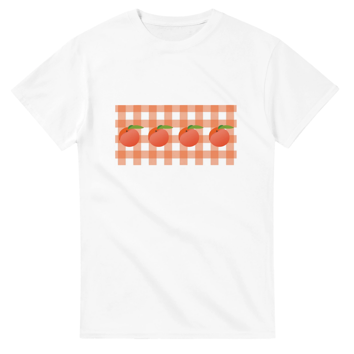 White women's tee with peaches on orange gingham background, summer fruit aesthetic.