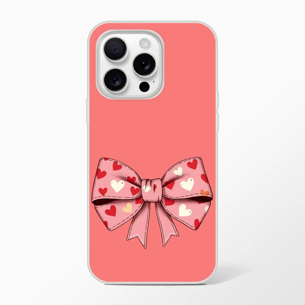 Pink iPhone 13-16 case with cream bow and heart pattern for a coquette aesthetic.