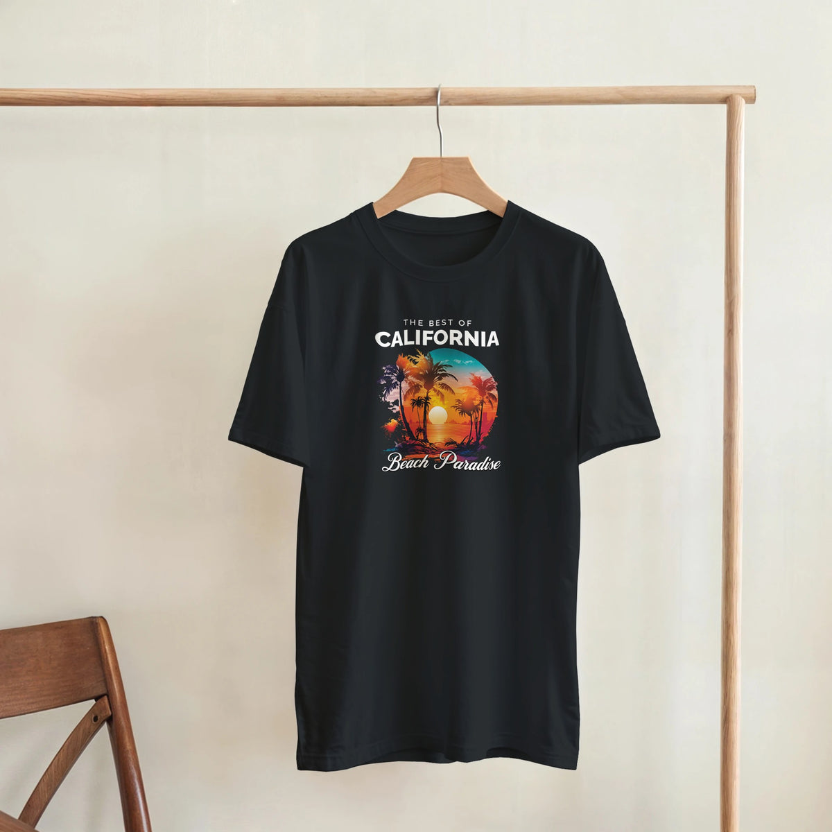 Black women's graphic T-shirt with California Beach Paradise palm trees sunset design on soft cotton blend fabric.
