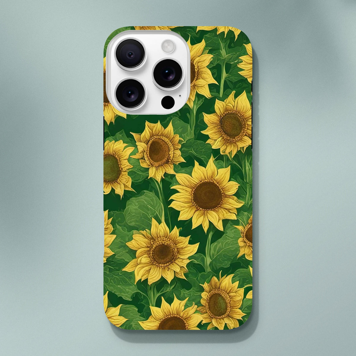 Tough iPhone case featuring a vibrant sunflower floral pattern with yellow blooms and green leaves on a dark background.