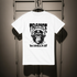 White t-shirt with a graphic design of a gorilla wearing headphones and the text 'Trance Gorilla' on a wooden background.