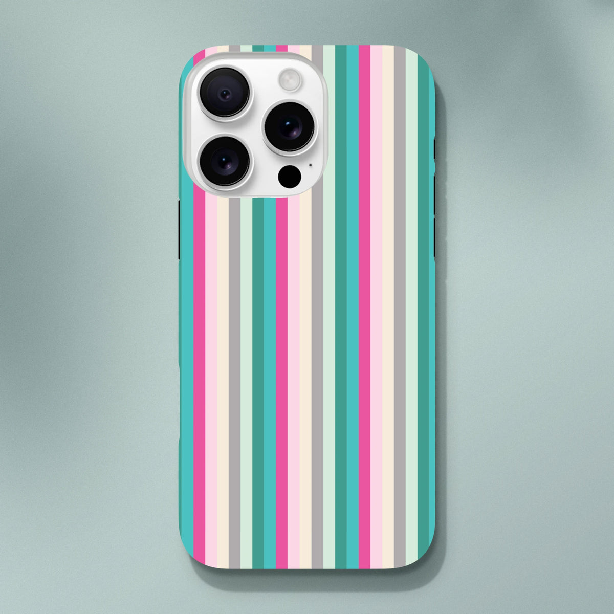 Retro pastel stripe iPhone case in pink and aqua featuring vertical stripes for durable city-style protection.