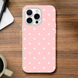 Retro pastel pink iPhone case with white polka dots. Lightweight matte TPU cover for drop protection on iPhone 13-16.