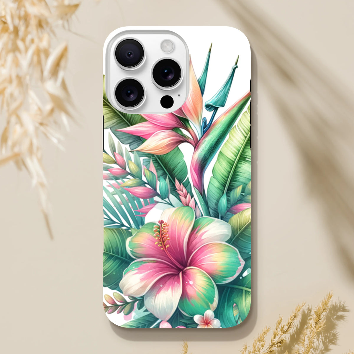 Tropical Hibiscus tough iPhone case featuring a vivid pink floral print and lush green leaves on a white background.