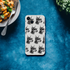 Clear slim iPhone case for 13-16 with a grayscale gangster dog repeating pattern wearing sunglasses.