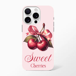 Vintage-style pink iPhone case featuring glossy red cherries tied with a ribbon bow and Sweet Cherries script text.