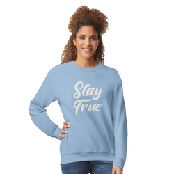 Woman wearing a light-blue Stay True sweatshirt, a cozy top for women with white script text.