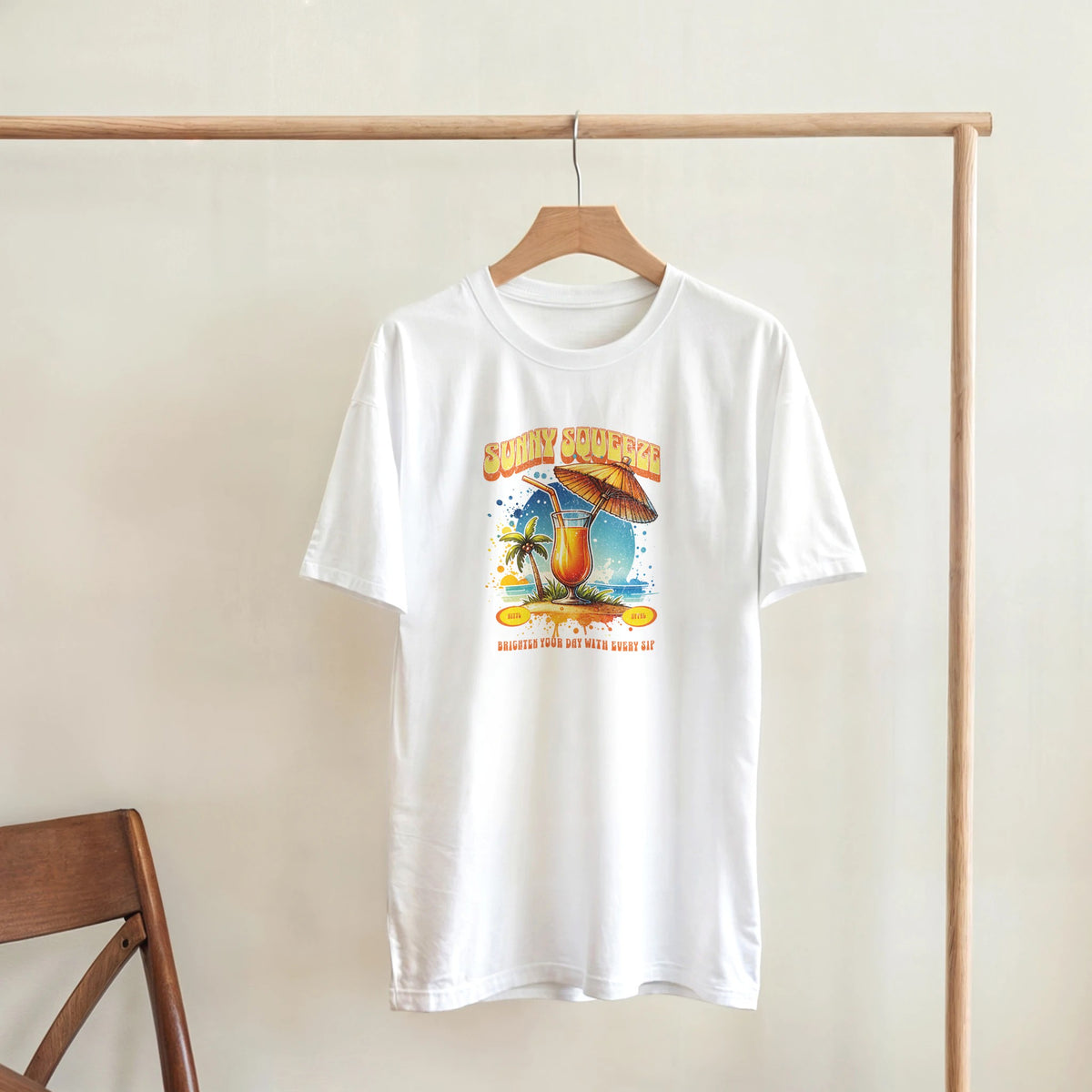 White cotton-blend women's Tropical Cocktail graphic T-shirt with colorful island cocktail print.