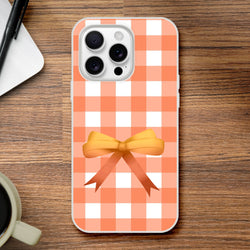 Orange gingham bow iPhone case for iPhone 13-16, cute coquette aesthetic with vibrant vintage-inspired style.