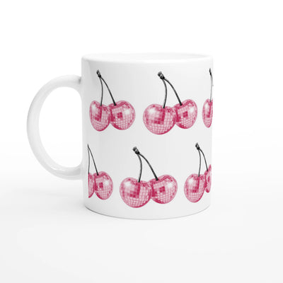 Glitter Ball Cherries mug: glossy white ceramic with repeating pink glitter cherry print.