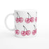 Glitter Ball Cherries mug: glossy white ceramic with repeating pink glitter cherry print.