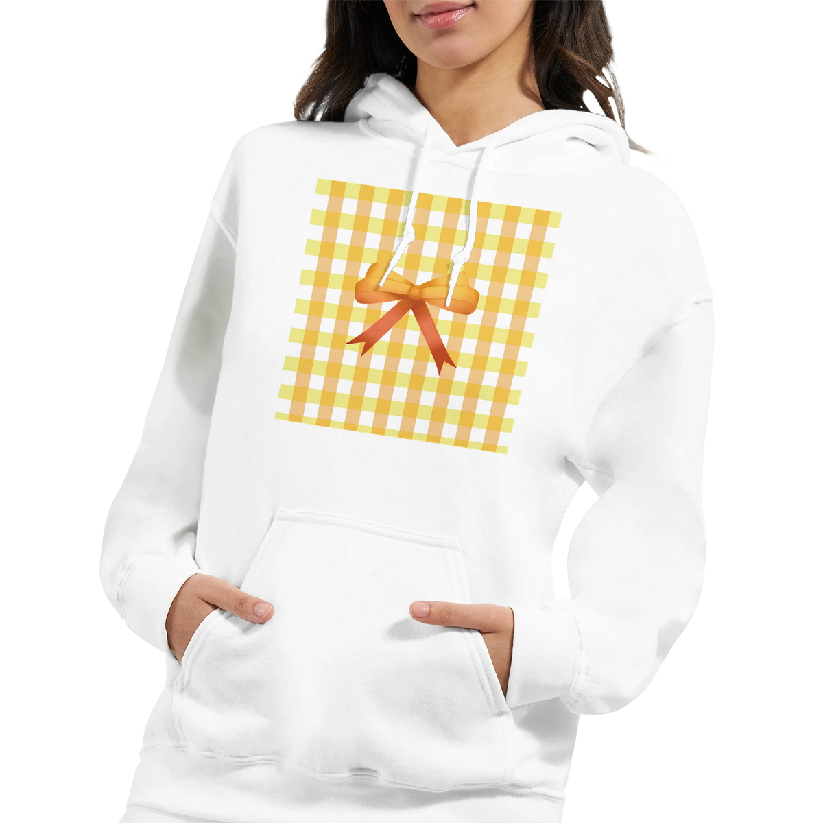 White hoodie featuring yellow gingham square and 3D orange bow print. Coquette aesthetic women's jumper with front pocket and oversized fit.