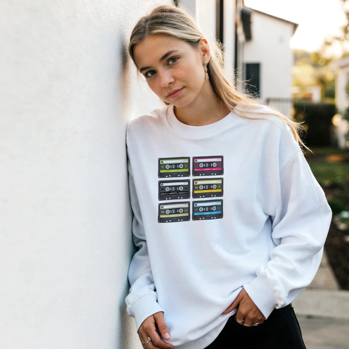 White retro cassette tape sweatshirt for women featuring colorful 90s music graphic jumper design.