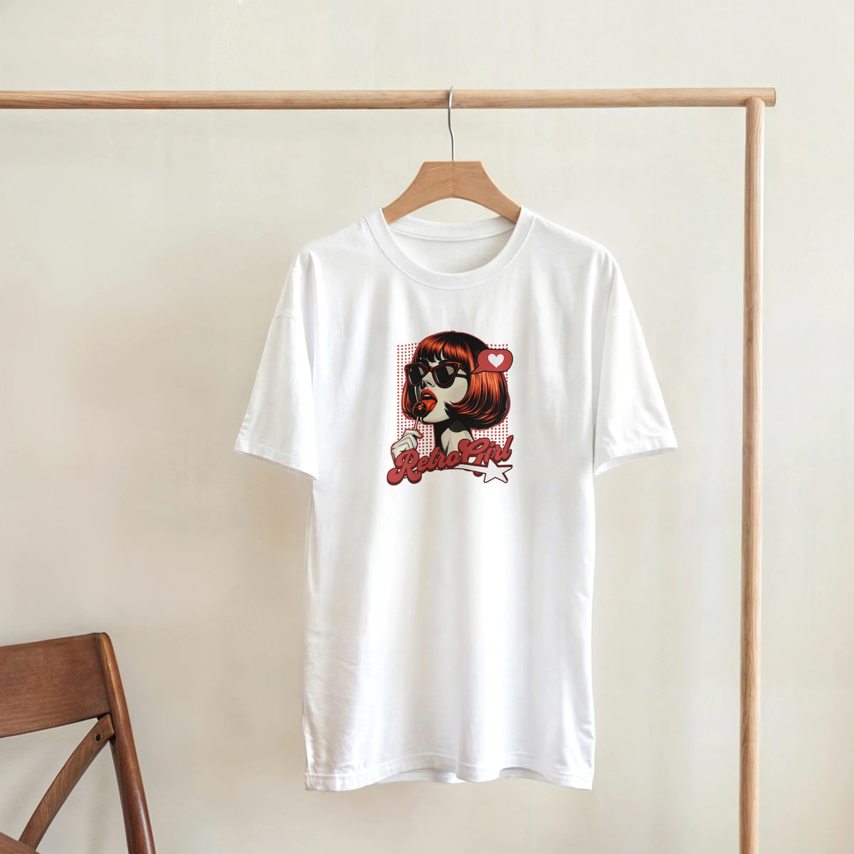 White cotton-blend T-shirt featuring retro pop-art graphic of a woman with sunglasses and red lips, 'Retro Girl' logo.