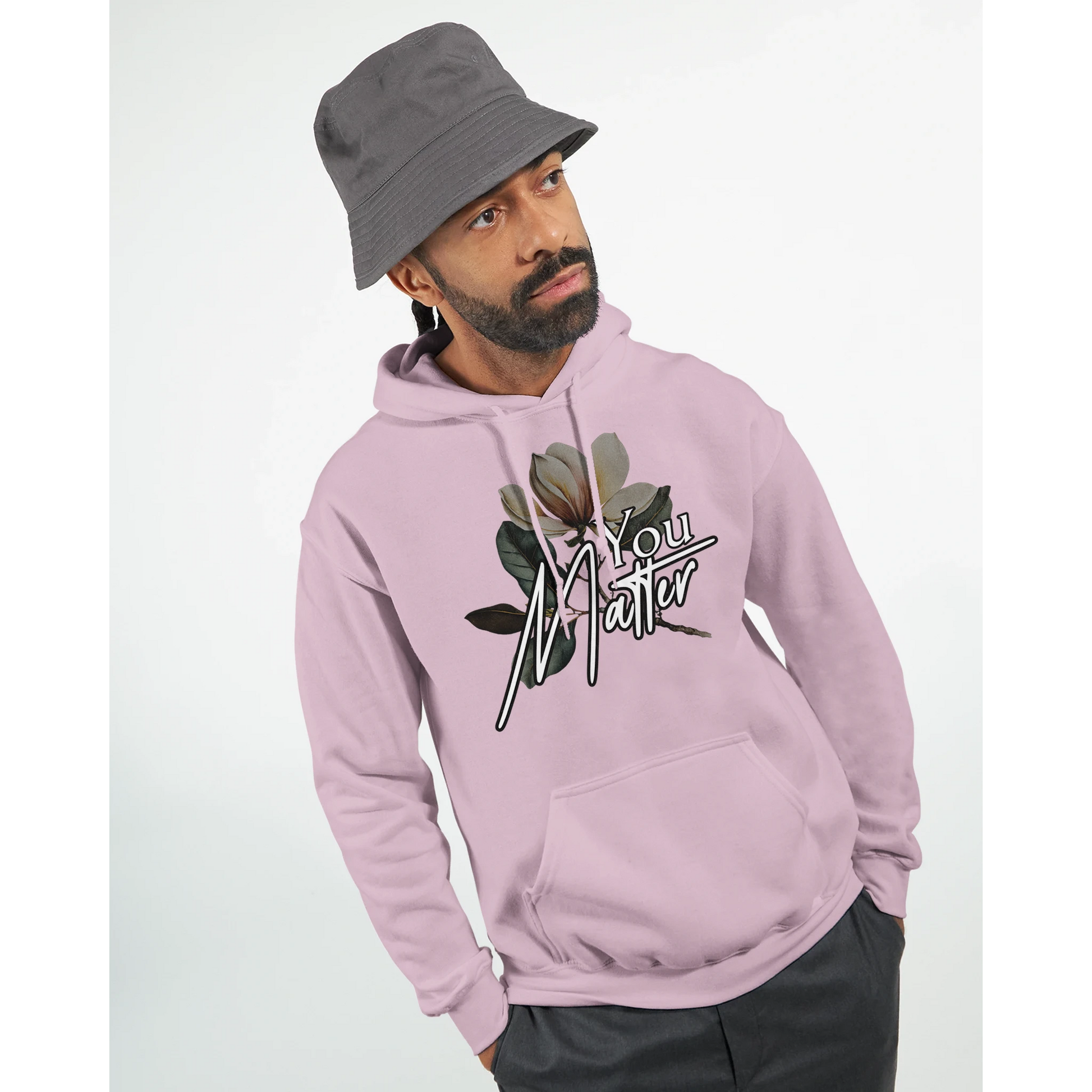Male model in pink hoodie with You Matter slogan and floral graphic, front kangaroo pocket.