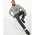 Man modeling Panda DJ graphic hoodie in heather grey with colorful panda print, sitting on a white stool.