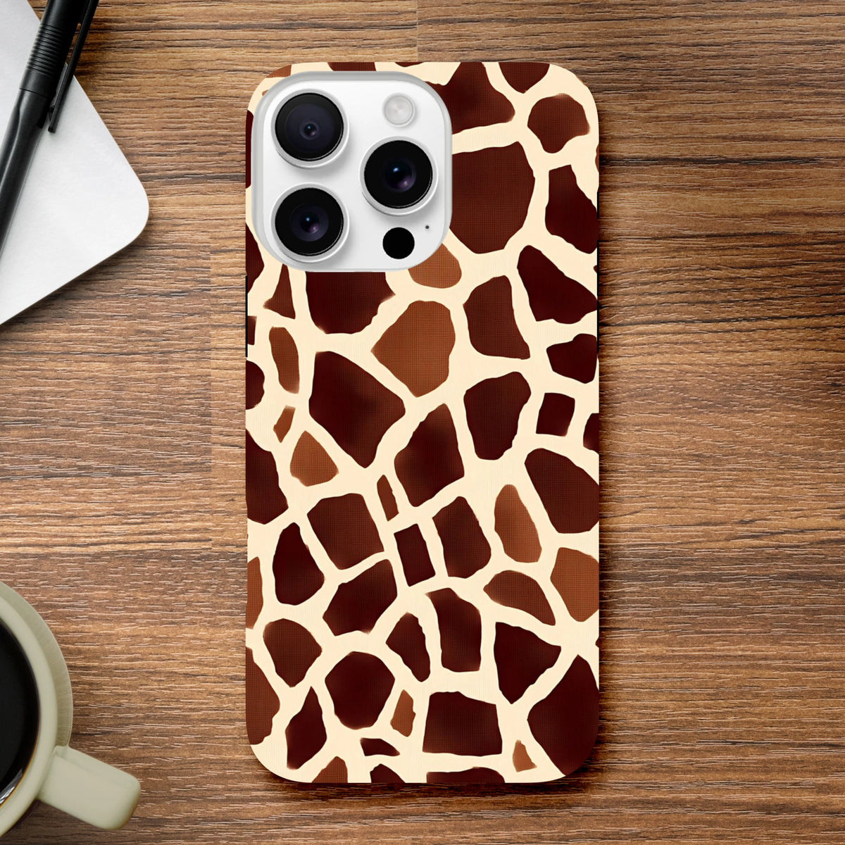 Bold giraffe print tough iPhone case featuring a safari animal pattern. Wild wildlife motif wraps around edges for durable protection and streetwear style.