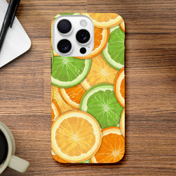 Tough iPhone case featuring a vibrant wraparound print of sliced orange and lime citrus fruit slices for models 13-16.