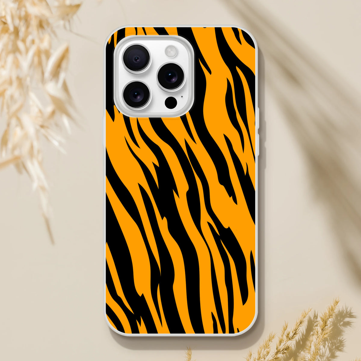 Orange and black tiger-print iPhone case for iPhone 13–16; slim matte shell with bold animal aesthetic.