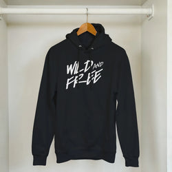 Cute Wild And Free Hoodie on hanger; black women's cozy slogan top with white script.